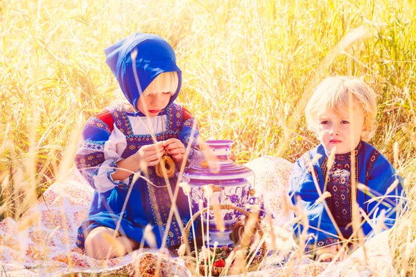 Kids wearing Russian costumes — Stock Photo, Image