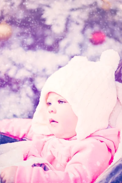 Baby girl in red Scandinavian dress — Stock Photo, Image