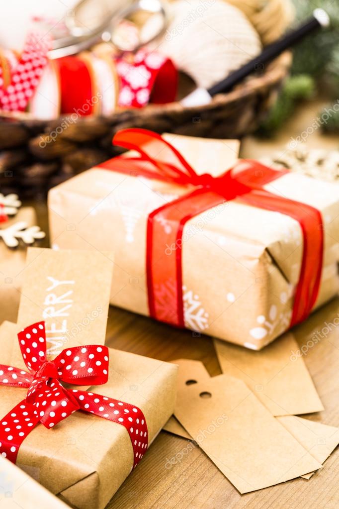 Christmas gifts wrapped in brown paper