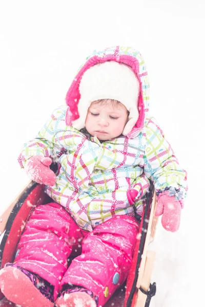 Girl playing in fresh snow — Stock Photo, Image