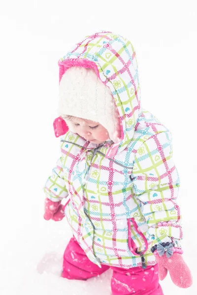 Girl playing in fresh snow — Stock Photo, Image