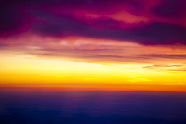 Impressionist evening clouds in mid air — Stock fotografie