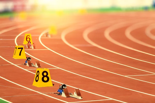 Bloco inicial em pista e campo — Fotografia de Stock