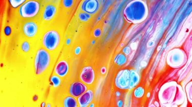 Arkaplan için sıvı içinde hareket eden renkli desenlerin makro görünümü