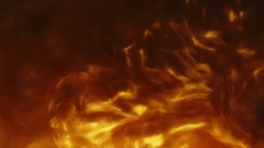 Parıldayan sıvı hareketi. Erimiş altın. Işıltılı sarı sıvı boya akışı.