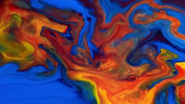 Altın tozunda renkli arka plan mavi ve kırmızı boya akışı evren renkleri yüzey karışımı desenler. makro