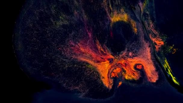 Liquid ink. reaction of colored paints on a black background. — Stock Video