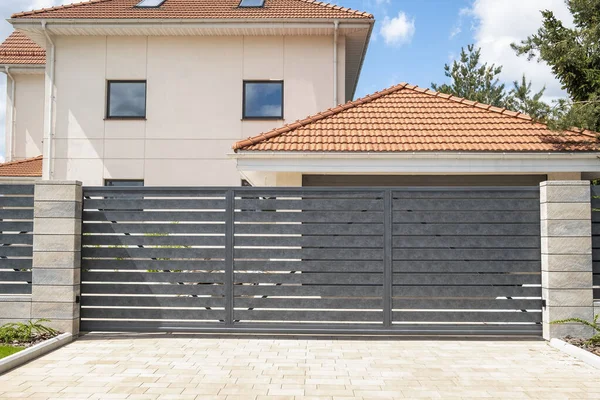 Grey protection fence. House protection