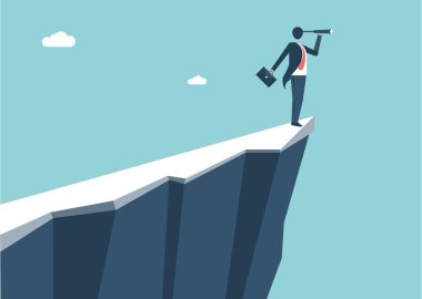 Uçurumun kenarında. Uçurumun kenarında duran işadamı casus gözlüklerinden bakıyor..