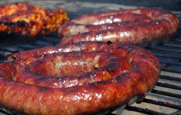 A big roll of grilled delicious traditional African Stock Image