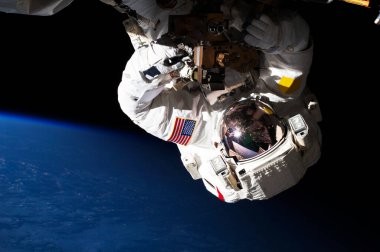 NASA astronotları uzayda - 11 Mayıs 2013. Arka plan şablonu, NASA tarafından desteklenen bu resmin elementleri