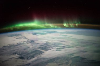 21 Ocak 2016 'da Kanada üzerinde Aurora resmi. Arkaplan şablonu, bu görüntünün unsurları NASA tarafından desteklenmektedir.