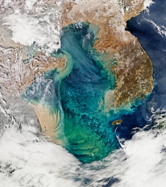 Sarı Deniz 'de okyanus renginin uzaktan algılanması. Arkaplan şablonu - Nasa tarafından desteklenen bu resmin ögeleri