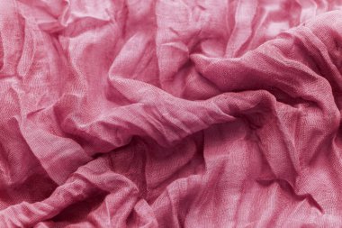 Pembe buruşuk keten kumaş dokusu arkaplanı kapat