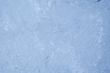 Dokulu alçılı ve yıpranmış klasik kaplamalı Grunge mavi duvarı.