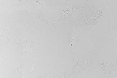 Bu duvar herhangi bir tasarım projesini geliştiren ince dokulu bir yüzeye sahiptir..