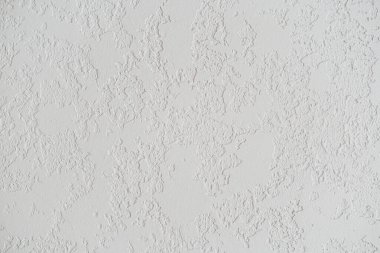 Kabaca beyaz desenli sıva duvar sıva dış yüzey arka planının soyut deseni