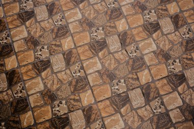 Geometrik kahverengi ve bej desenli taş döşeme mimari arka plan ve iç tasarım konsepti için