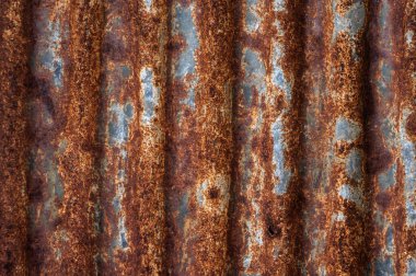 Paslı, metal bir çatı dokusu. Pas, suyun veya havanın katalitik varlığıyla oluşan demir ve oksijen reaksiyonundan oluşan demir oksit türüdür..