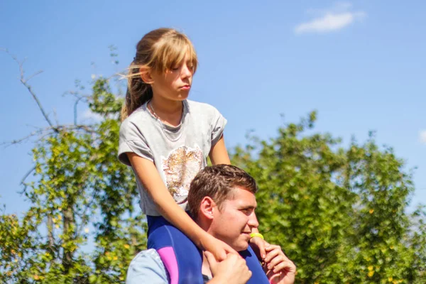 Defocused Brother Riding Sister Back Portrait Happy Girl Man Shoulders — Stock Photo, Image