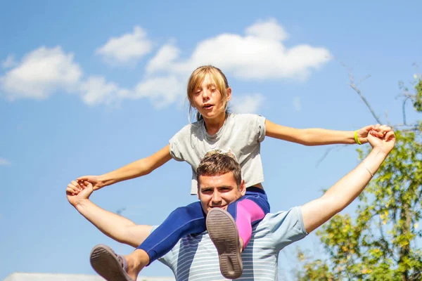 Defocused Brother Riding Sister Back Portrait Happy Girl Man Shoulders — Stock Photo, Image