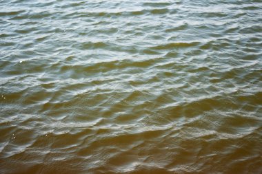 Deniz suyu arka planı. Mavi su dokusu. Sakin mavi su sıvı dokuyu dalgalandırır. Doğal su dalgaları arkaplan alanı kopyala.