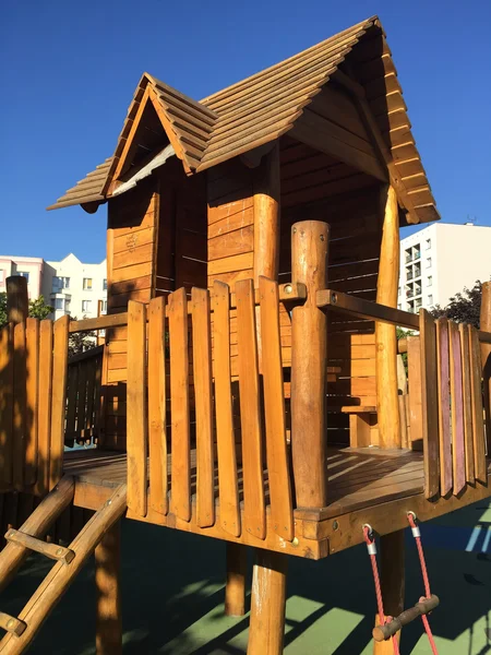 Wooden playground structure in city — Stock Photo, Image