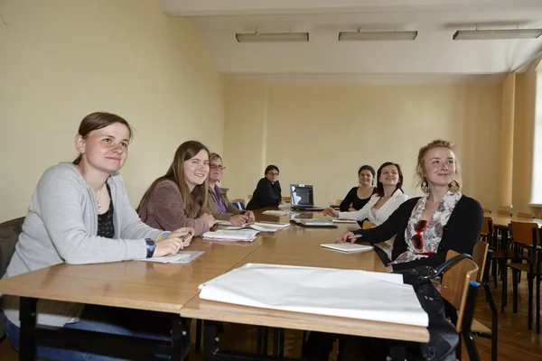 Female students in classroom — Stock Photo, Image