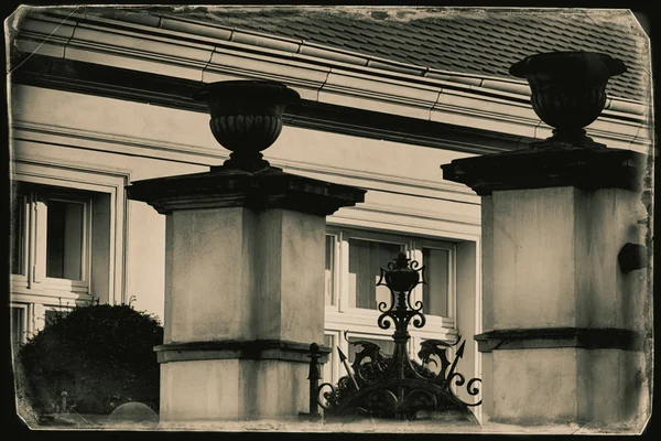 Gate to grand mansion - vintage photo — Stock Photo, Image