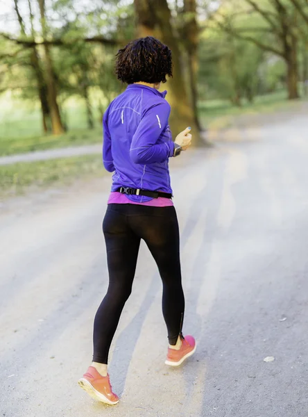 Jovem jogger feminino — Fotografia de Stock