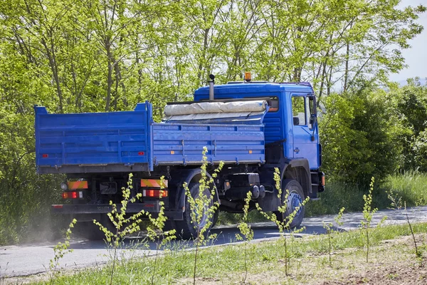 Blue truck in the countryside — Stock Photo, Image