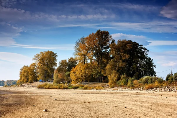 Dried lake with some boats — Stock Photo, Image