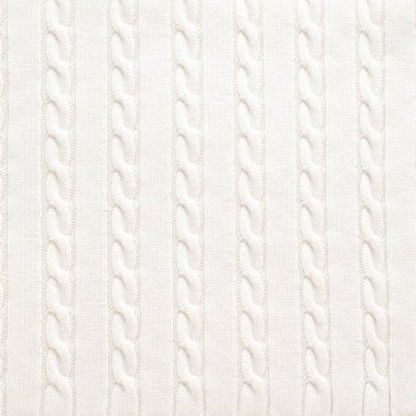 Örgü yün arka plan. Beyaz desenli yün kazak.