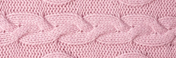 Pletené vlněné pozadí. Růžová textura pletený vlněný svetr — Stock fotografie