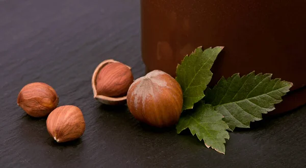 Closeup Hazelnuts Clipping Path Included Black Wood Table — Stock Photo, Image