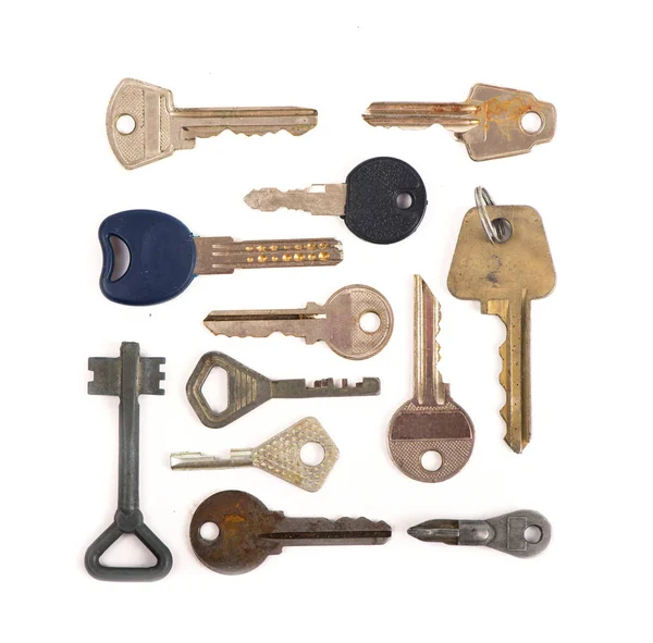 stock image overhead of many different keys in oder on wooden background concept