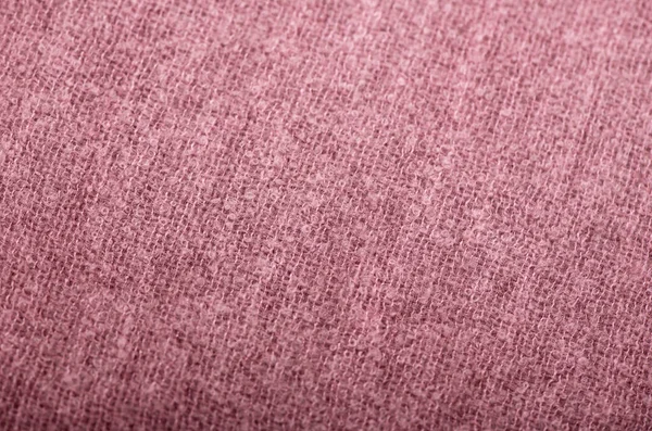 closeup of seamless pink knitted fabric texture
