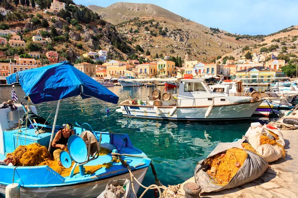 Boats in harbor of Symi island in Grece. Royalty Free Stock Photos