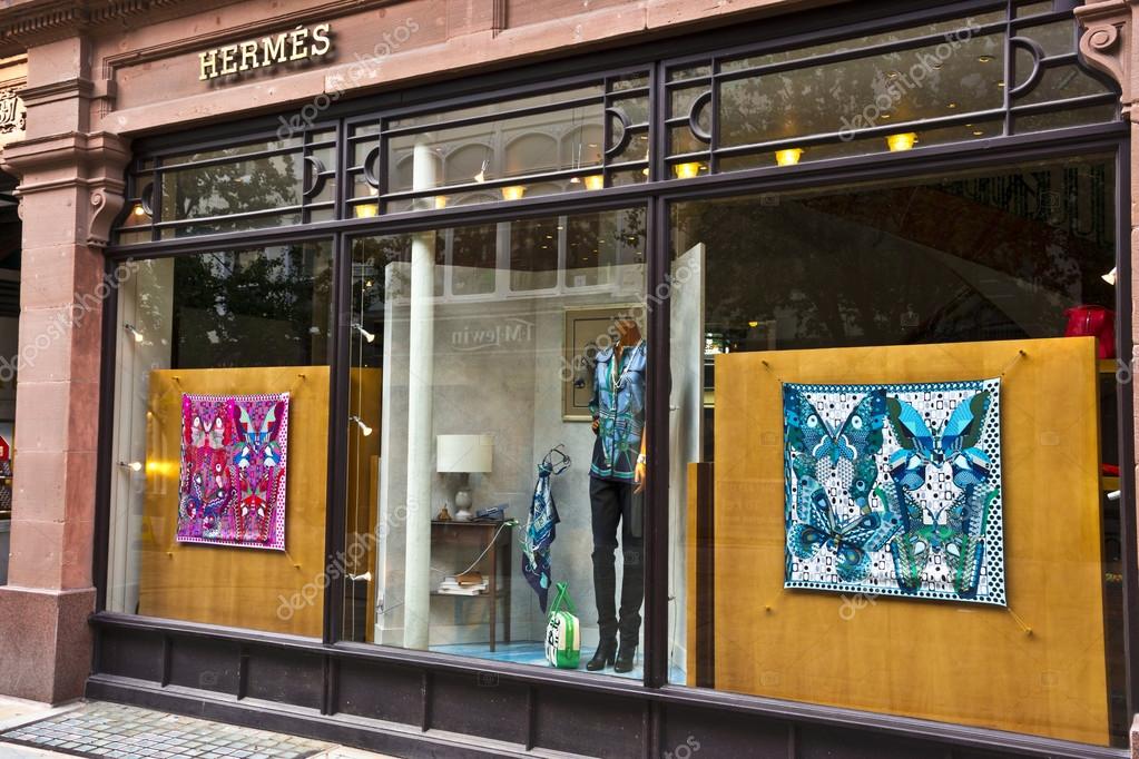 MANCHESTER, UK - SEPTEMBER 18, 2014: Window display of the Hermes French luxury goods boutique in the city centre.
