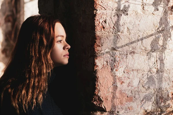 Young Girl Looks Out Old Barred Window Ancient Fortress Sunset — Φωτογραφία Αρχείου