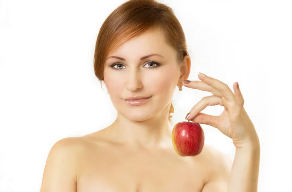 Молода жінка тримає яблуко в руці — стокове фото