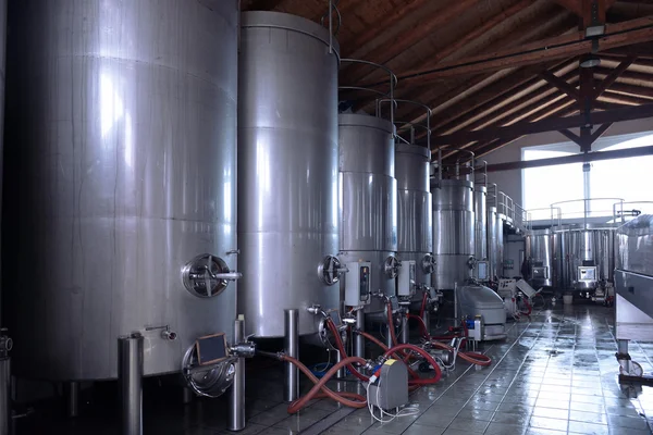 Stainless steel wine vats in a row — Stock Photo, Image