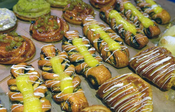 Croissants on a shelf pastry shop — Stock Photo, Image