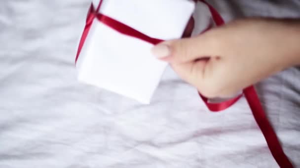 Girl Hand Close Packing Valentine Day Gifts Boyfriend Home Sitting — Stock Video