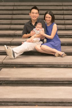 oğlu ile Çinli aile