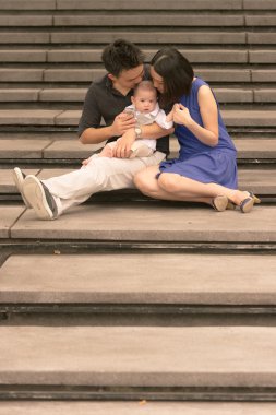 oğlu ile Çinli aile