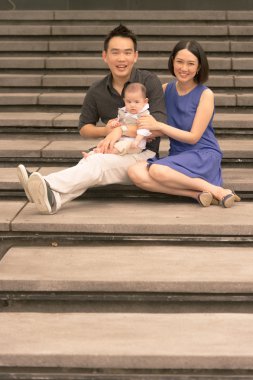 oğlu ile Çinli aile