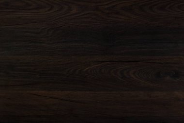 Ahşap kahverengi doku. Koyu ahşap soyut arkaplan.