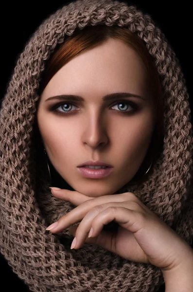 Portrait of a girl in a scarf-snood large knitted — Stock Photo, Image