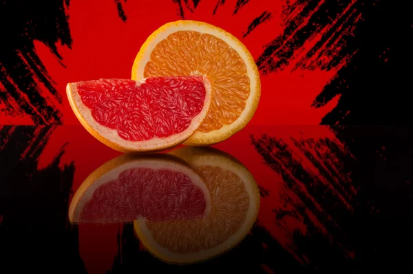 Slices of orange and grapefruit — Stock Photo, Image